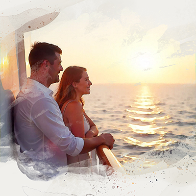 Couple enjoying a sunset from a cruise ship deck, symbolizing peaceful and luxurious cruise travel experiences.