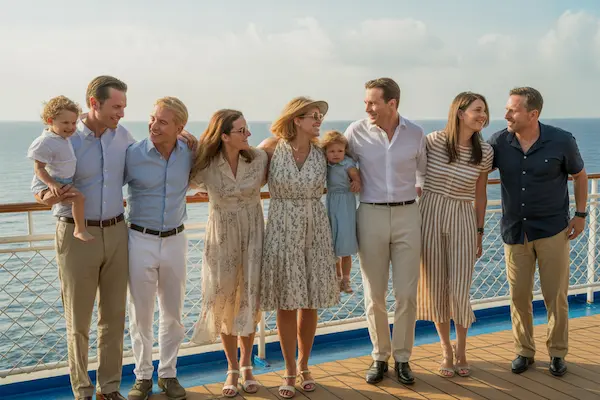 Multi-generational family group enjoying time together on cruise ship deck